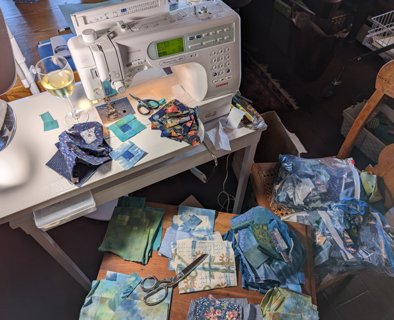 Sewing machine and scraps of blue
